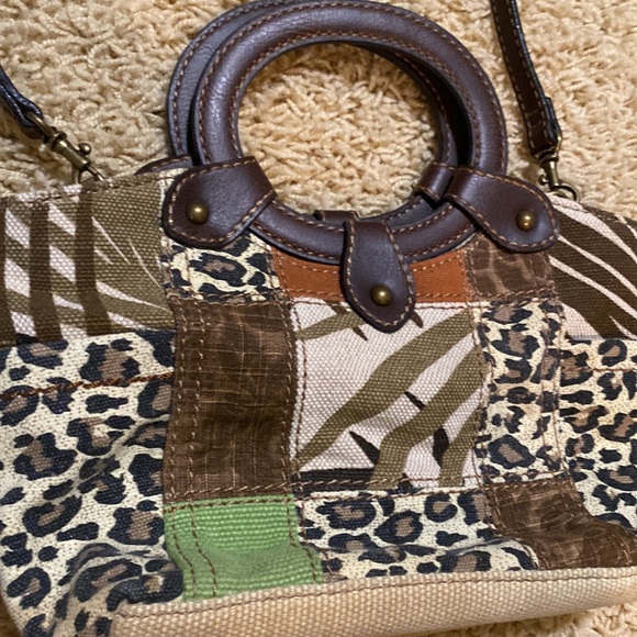 Fossil small womens purse with cheetah print material. Removable leather strap. - Picture 2 of 3